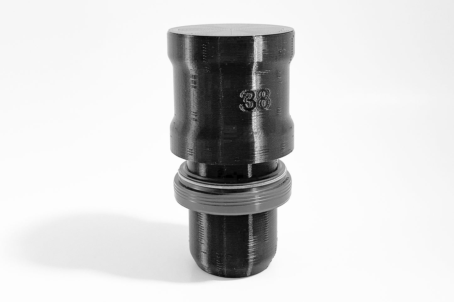 Example of Momentum Cycle's 3D printed MTB Fork Seal Driver Tools with a dust seal wiper on. Home Mechanic getting ready for MTB maintenance.
