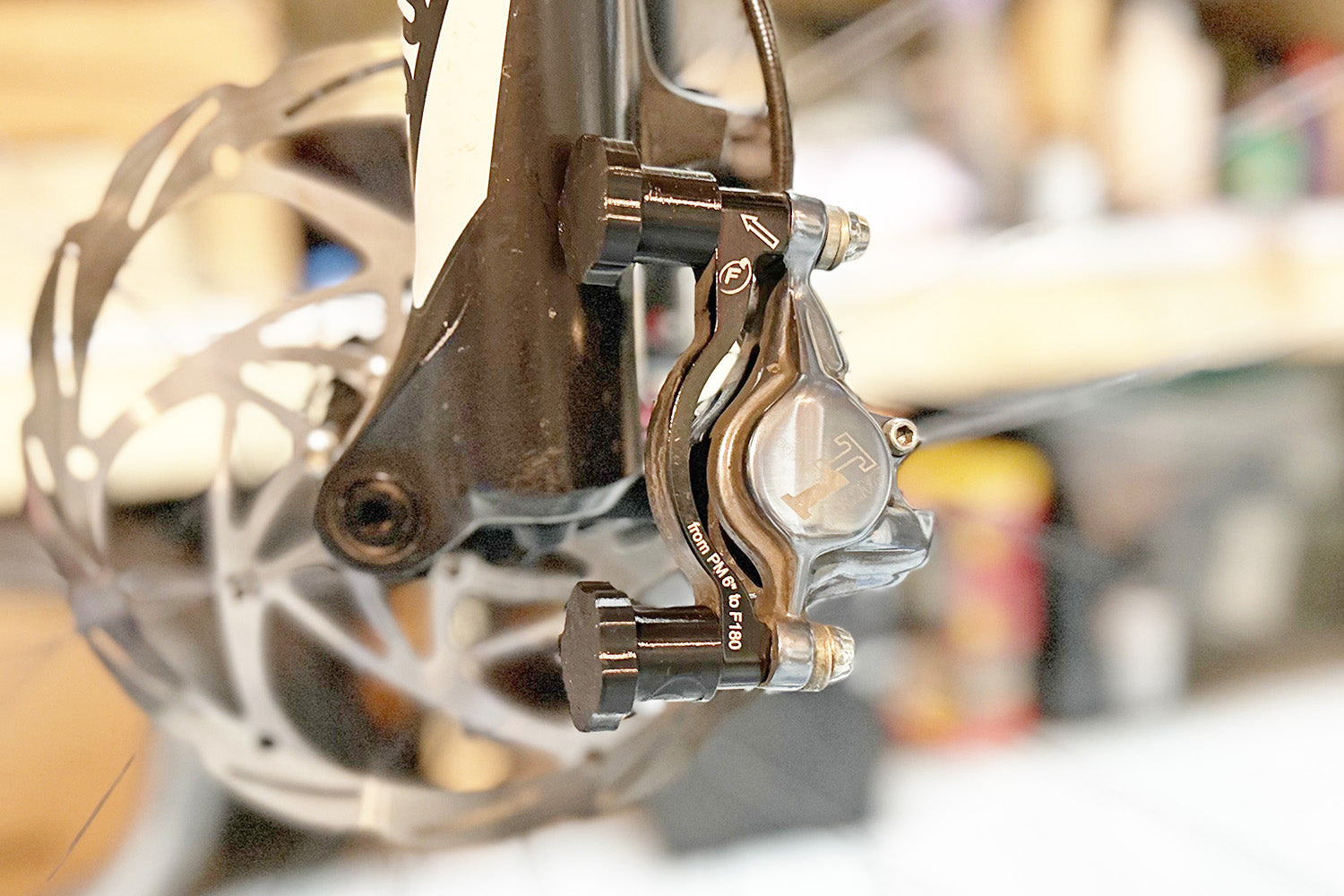 Momentutm Cycle's 3D printed Bolt Caliper Holders retaining all hardware on a MTB hydraulic brake system.