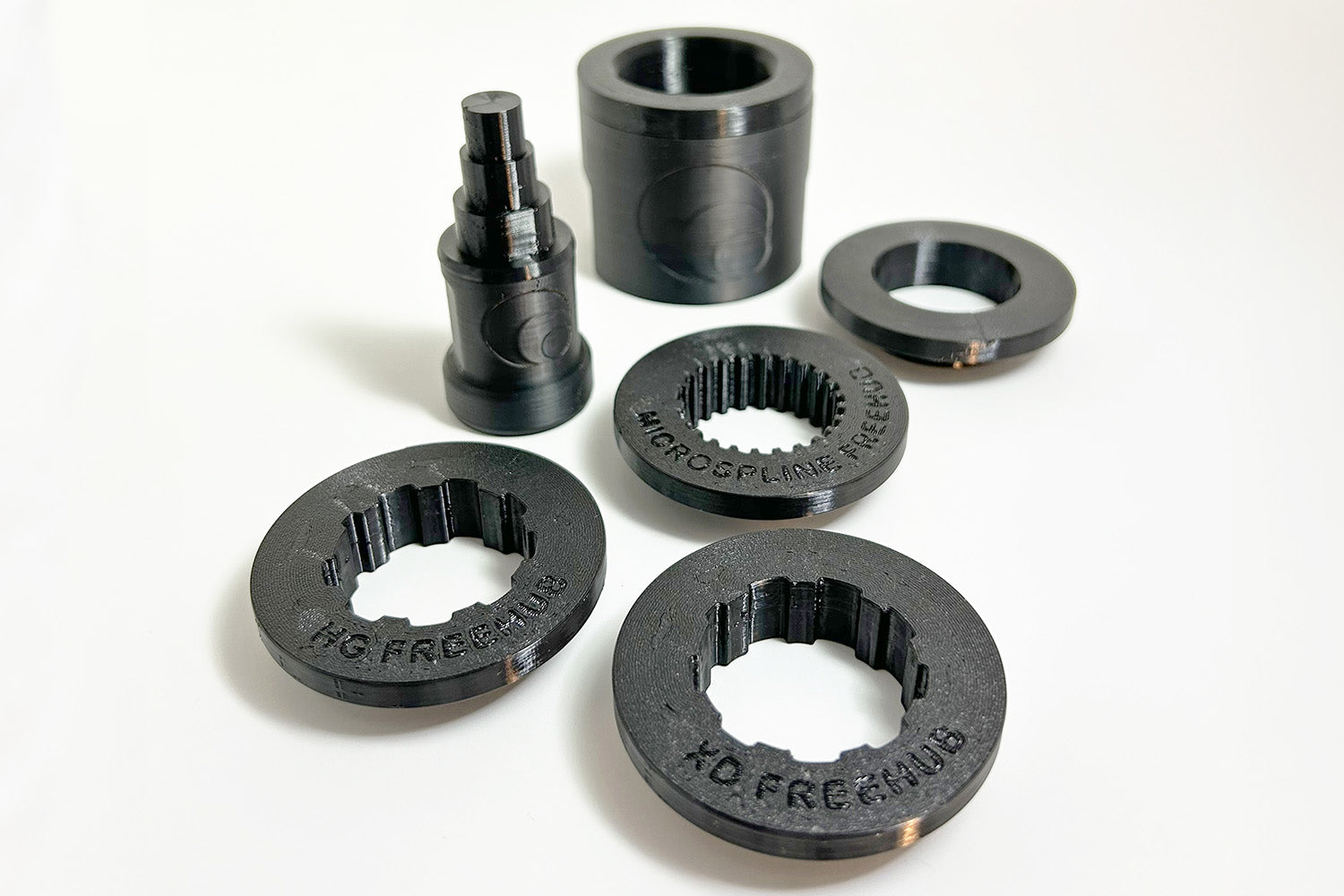 XD, HG, Microspline and Generic Freehub Adaptors made of rigid "soft touch" thermoplastic. Made to be used in conjunction with our Hub Support.