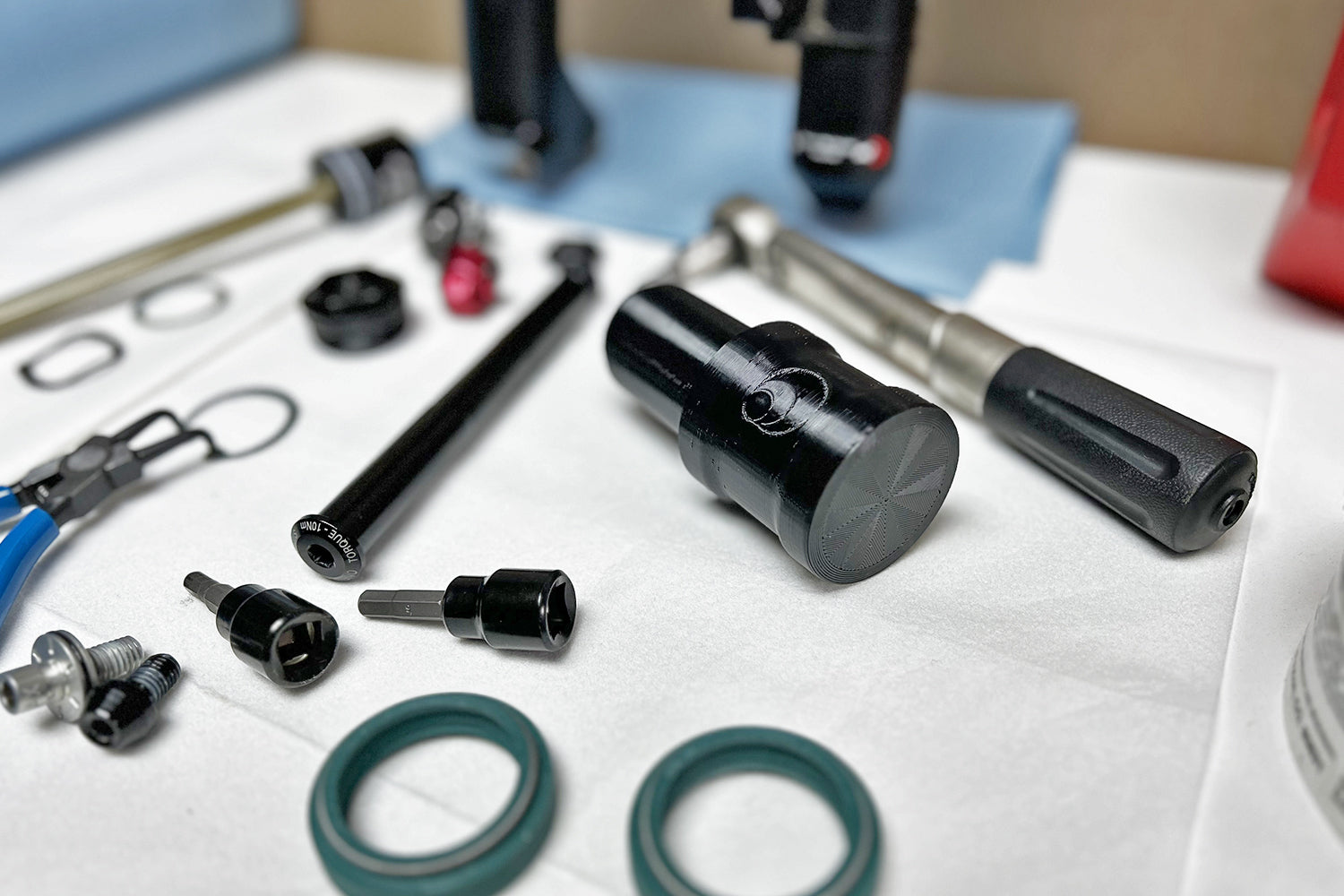 Mountain bike fork seal driver tool for installing 30mm to 40mm dust wiper seals.