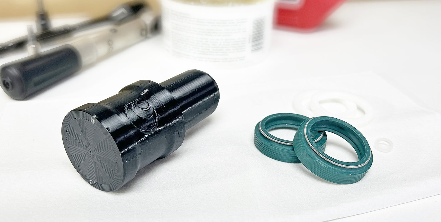 MTB fork maintenance preparation using Momentum Cycle's 3D printed Fork Seal Driver Tool.